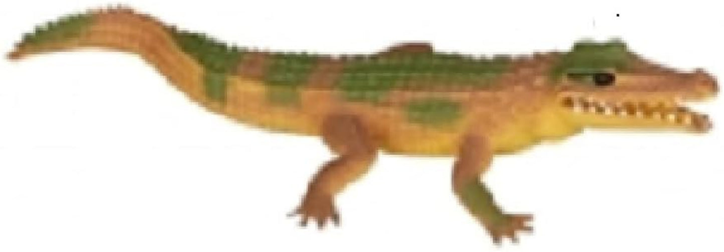 Toy alligator on a white background