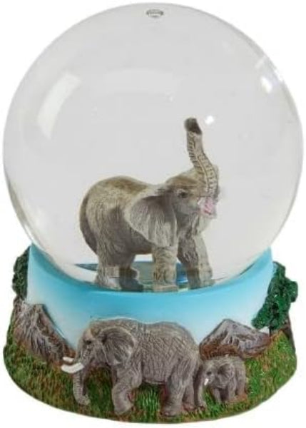 Glowing snow globe with elephants on a white background