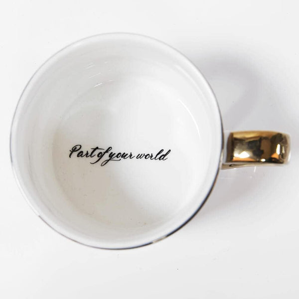 White mug with gold handle and 'Part of your world' text on a white background