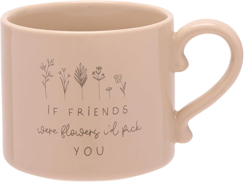 Pink mug with floral design and text on a white background