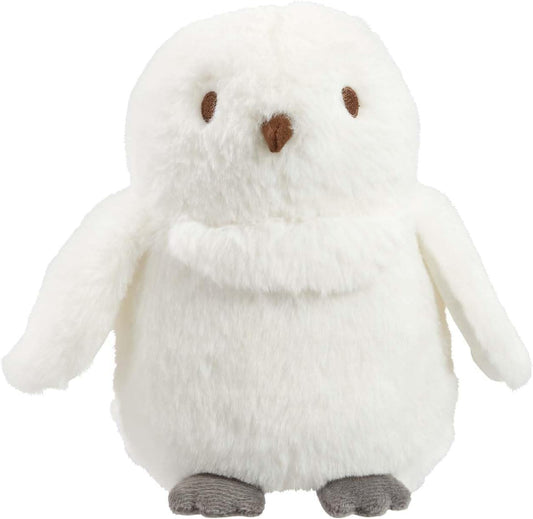 White plush penguin toy on a white background