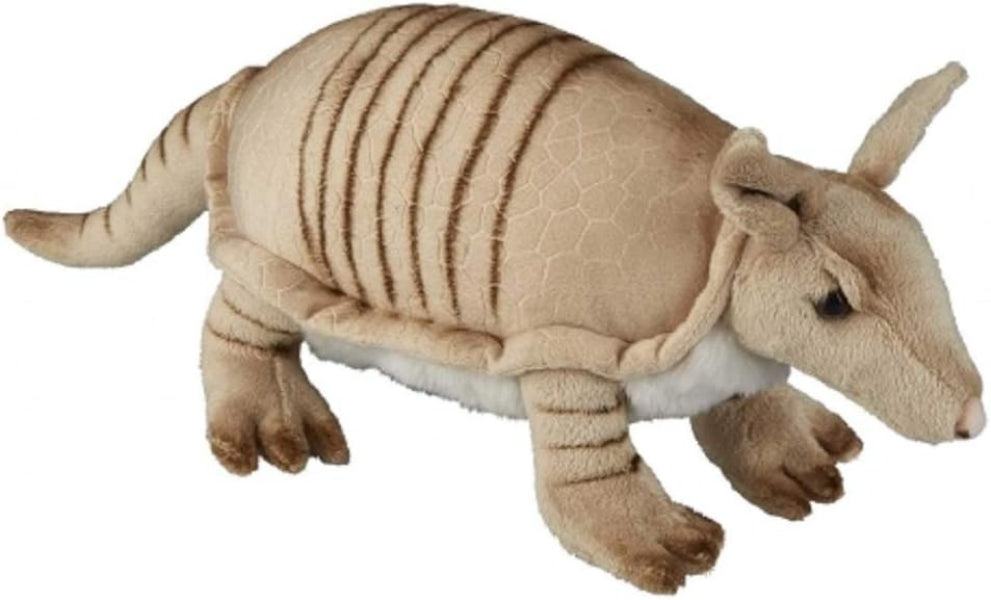 A plush armadillo toy with tan and beige striped fur, a textured shell pattern, and a white underbelly, shown against a plain white background.