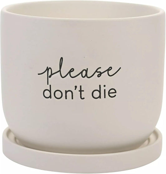 White ceramic pot with 'please don't die' text on a white background