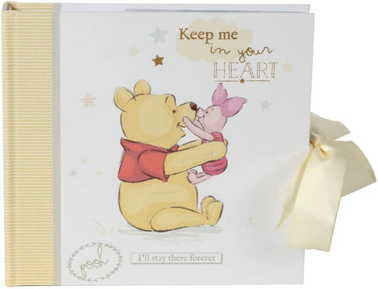 Book with Winnie the Pooh and Piglet hugging, text 'Keep me in your heart. I'll stay there forever.'
