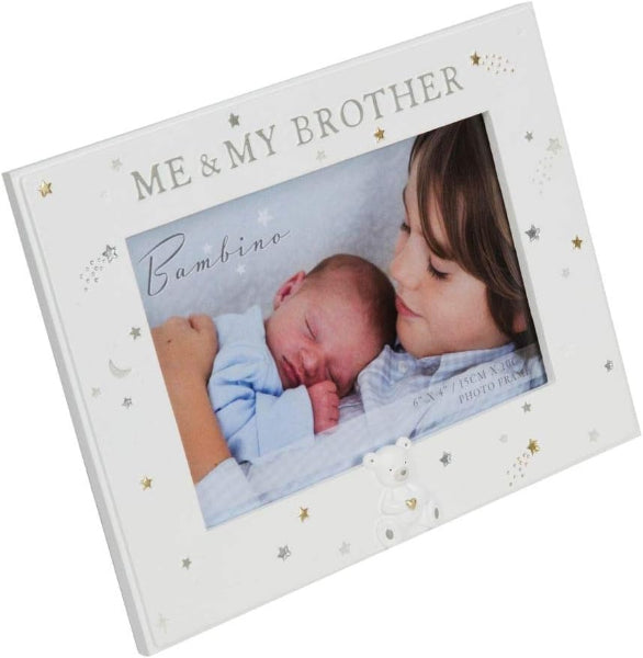 White photo album with 'Me & My Brother' text and a picture of a baby and child.