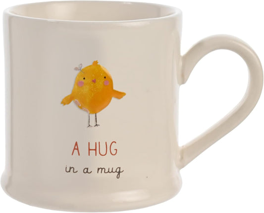 Mug with a chick illustration and 'A Hug in a Mug' text on a white background