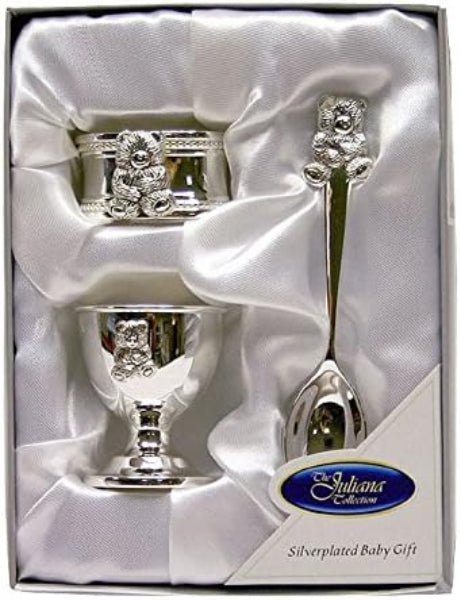Silverplated baby gift set with spoon, cup, and napkin holder in a box.