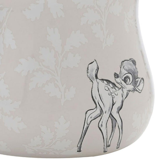 Illustration of a deer on a decorative lampshade with floral patterns.
