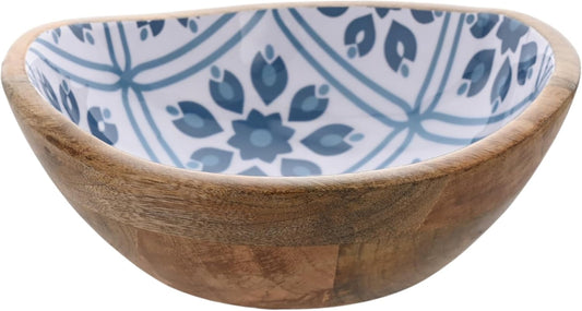 Wooden bowl with a blue and white patterned interior on a white background
