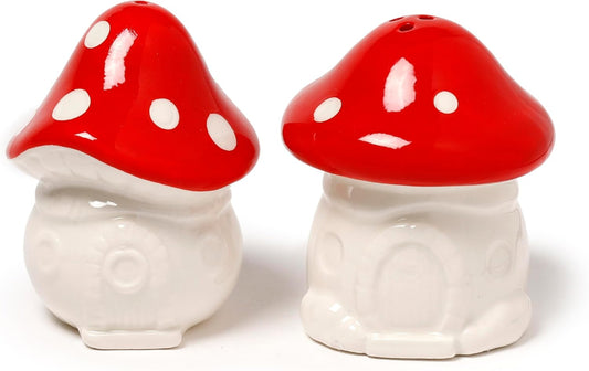 Two mushroom-shaped salt and pepper shakers on a white background