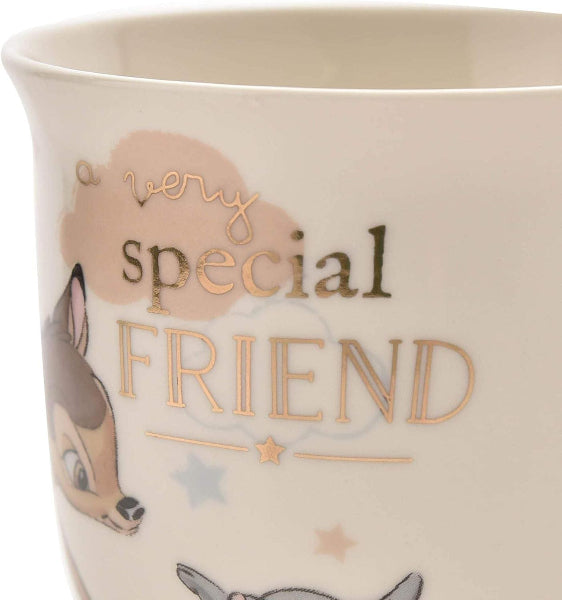 Ceramic mug with cartoon deer design and 'A very special friend' text on a beige background