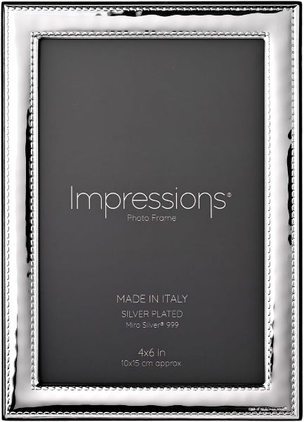 Silver-plated photo frame with 'Impressions' branding on a black background