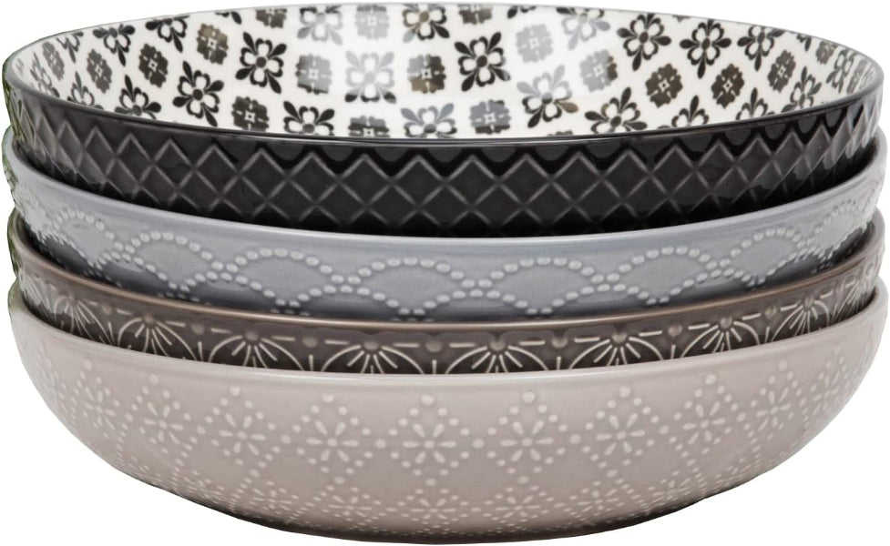 Set of four patterned bowls in gray, black, and white.