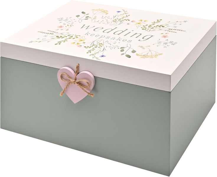 Wedding keepsakes box with a heart-shaped decoration on a white background