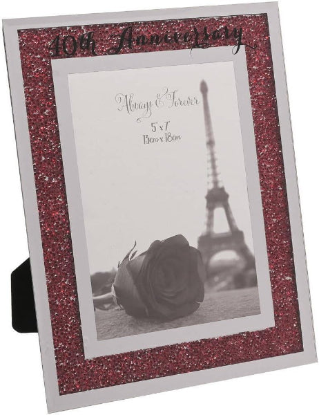 Decorative photo frame with pink glitter border featuring a rose and Eiffel Tower.
