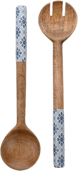 Wooden spoon with floral patterned handle on a white background