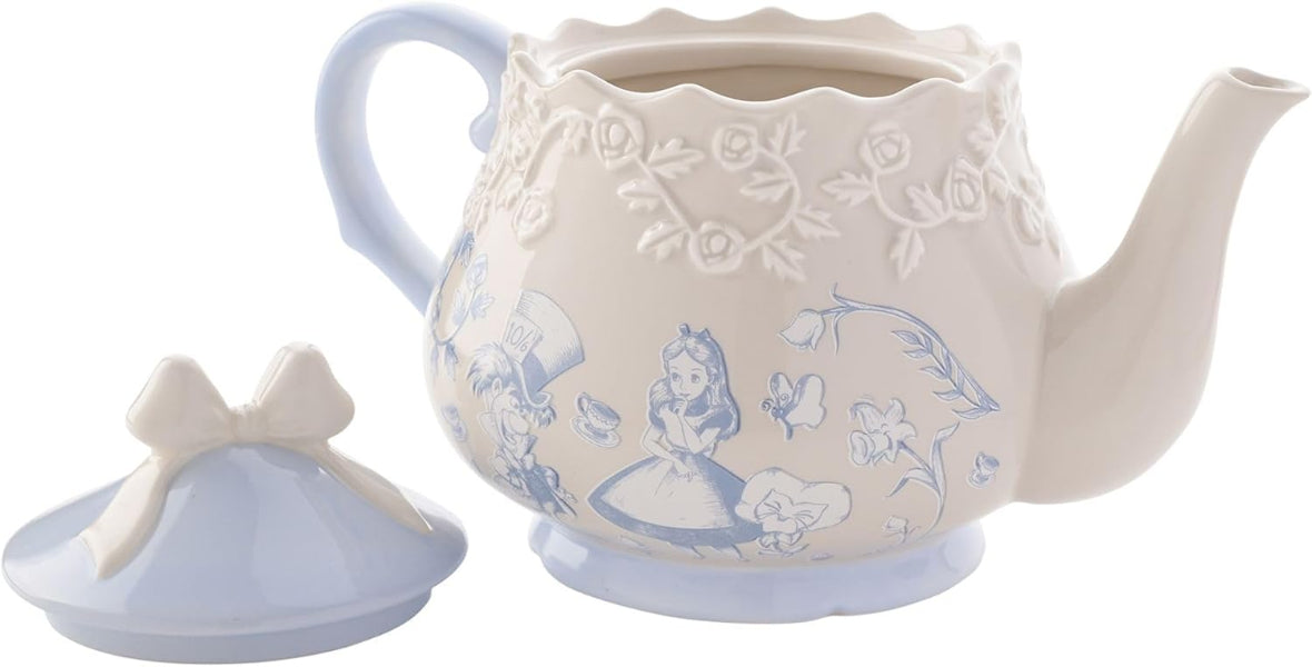 Ceramic teapot with decorative design on a white background