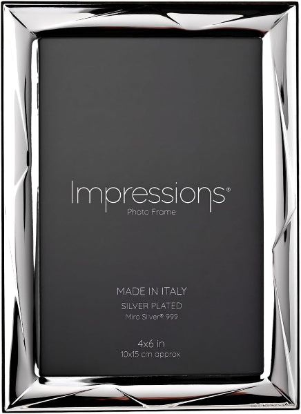 Silver photo frame with 'Impressions' branding on a black background.