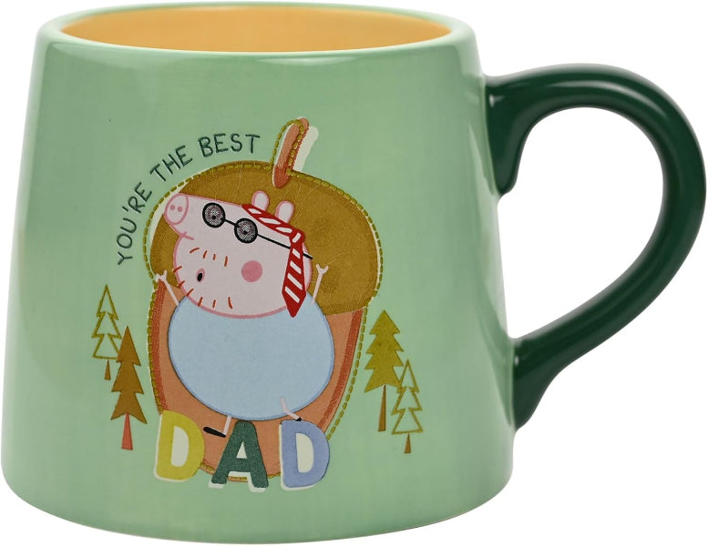 Green mug with cartoon bear design and text 'You're the best dad' on a white background