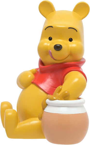 Yellow bear character with a red shirt holding a white bowl on a white background