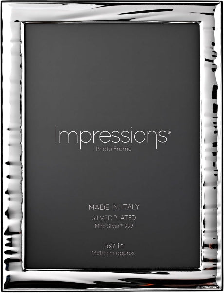 Silver photo frame with 'Impressions' branding on a black background