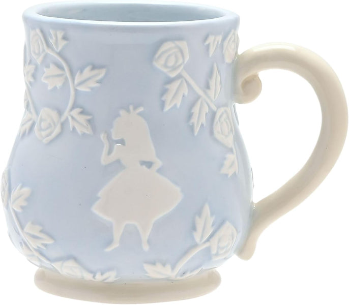 Ceramic mug with white silhouette design on a light blue background