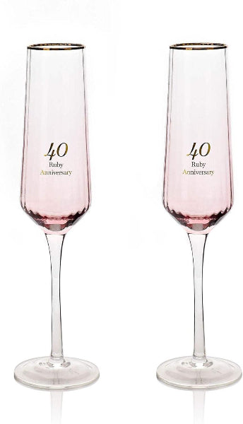 Two pink champagne flutes with '40 Ruby Anniversary' text on a white background