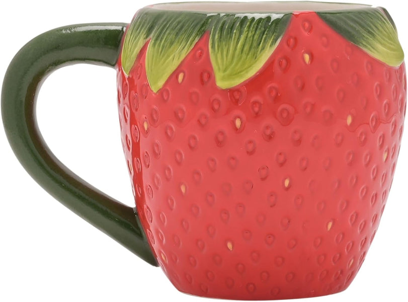 Strawberry-shaped mug with green handle on a white background