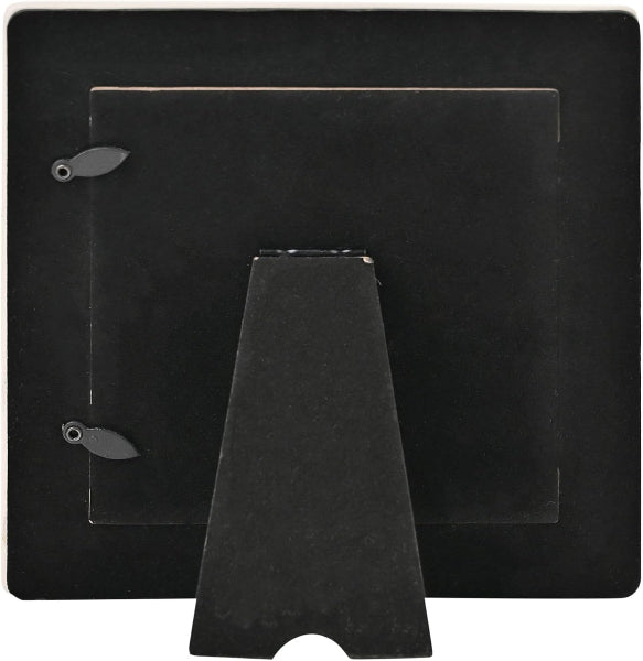 Set of black leather-bound books with a cone-shaped object on a white background