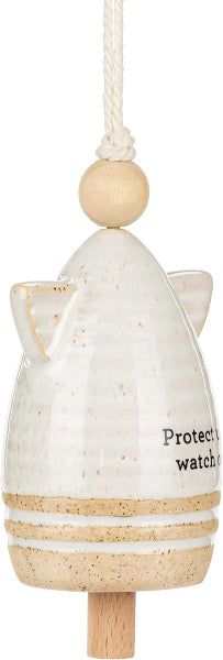 Decorative hanging ornament shaped like a cat with a wooden base and white body.