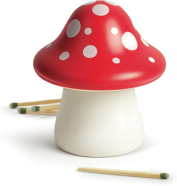 Mushroom-shaped musical instrument with red cap and white spots on a white background