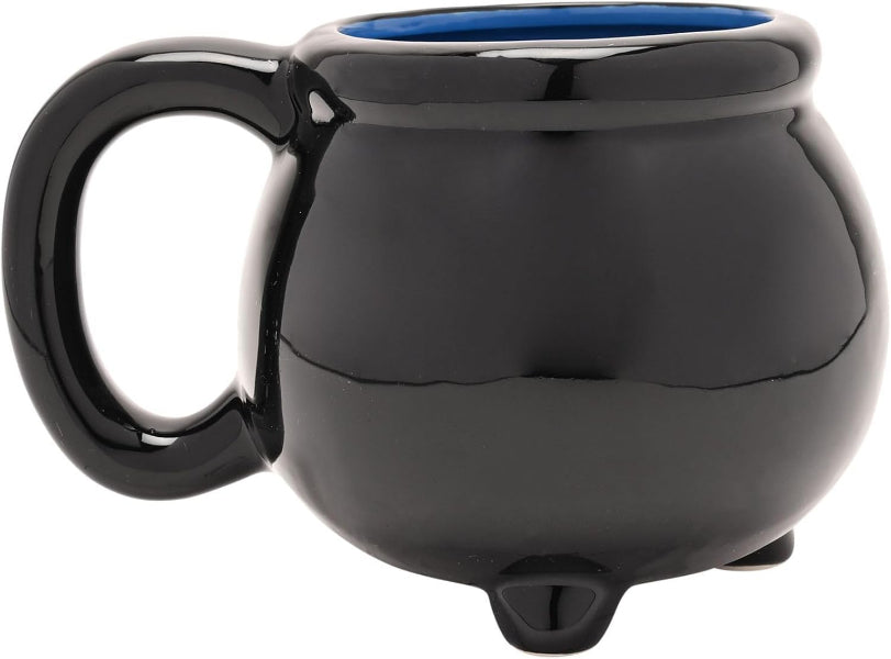 Black ceramic mug shaped like a cauldron with a blue interior on a white background