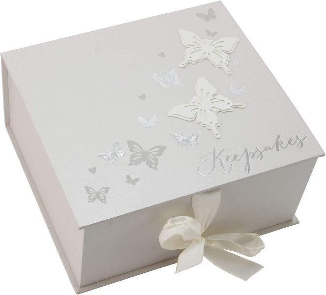 White decorative box with butterfly designs and a ribbon on a white background