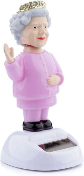 Sculpture of an elderly woman with a pink outfit and crown on a white background