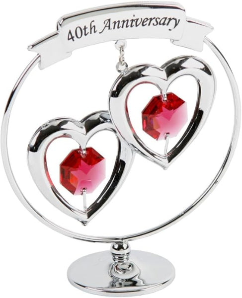 Decorative item with two interlocking hearts and red gemstones, labeled '40th Anniversary' on a white background.