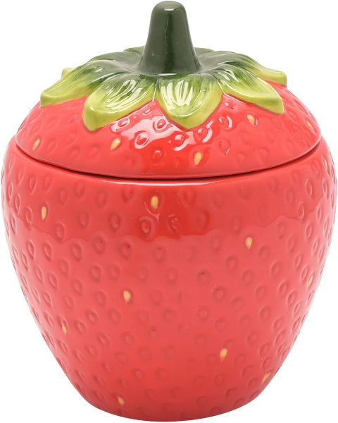 Red ceramic strawberry-shaped jar with a green lid on a white background