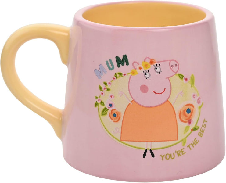 Pink mug with a cartoon character and 'Mum you're the best' text on a white background