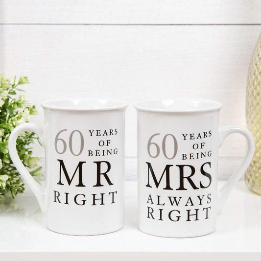 Two white mugs with text '60 Years of Being Mr Right' and '60 Years of Being Mrs Always Right' on a white surface.