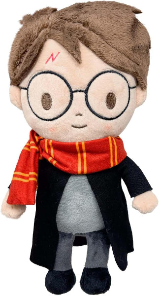 Plush toy of a character wearing glasses and a red scarf on a white background