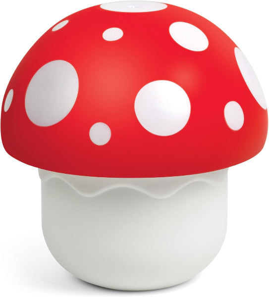 Mushroom-shaped container with red cap and white spots on a white background