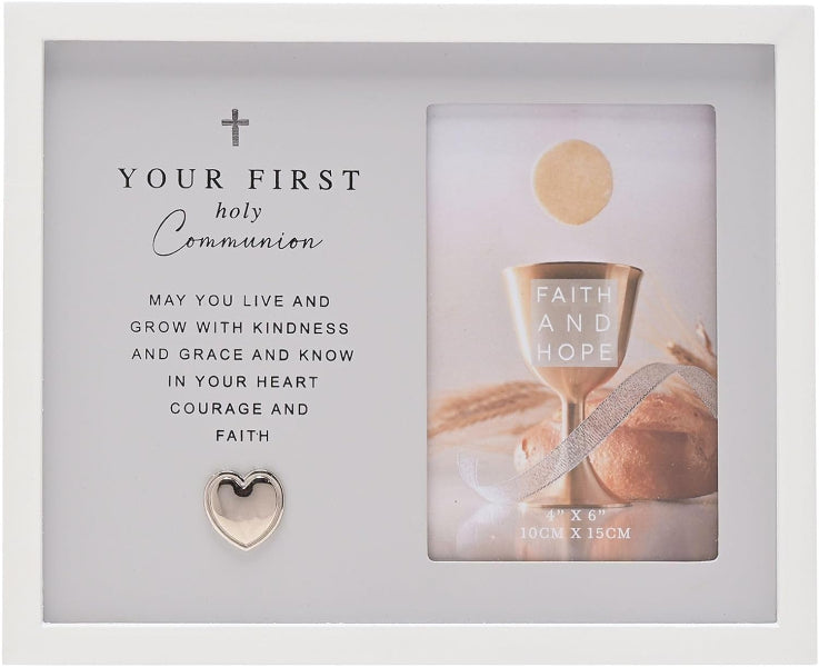 Decorative frame with 'Your First Holy Communion' message and heart-shaped object.