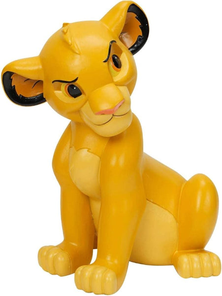 Toy figure of a lion with a serious expression on a white background