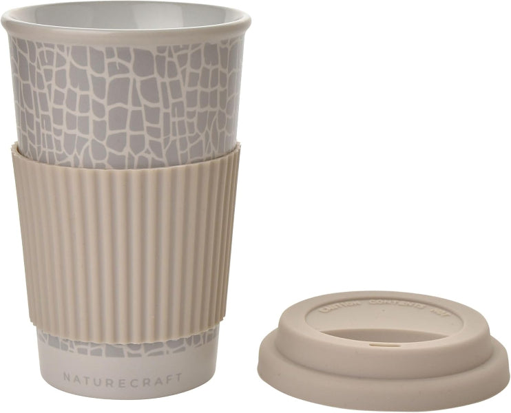 Reusable cup with textured design and beige sleeve on a white background