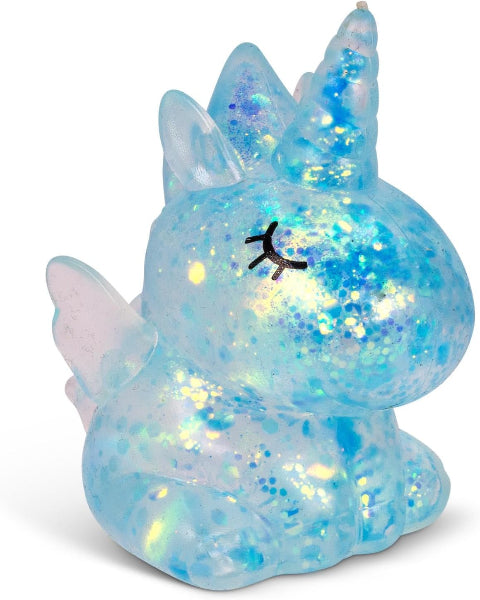 Iridescent unicorn figurine with glittery texture on a white background