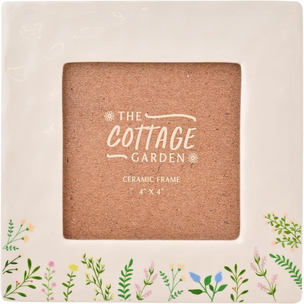 Ceramic picture frame with 'The Cottage Garden' branding on a floral-patterned background