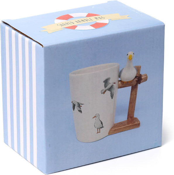 Mug with seagull design on a stand in a blue box packaging