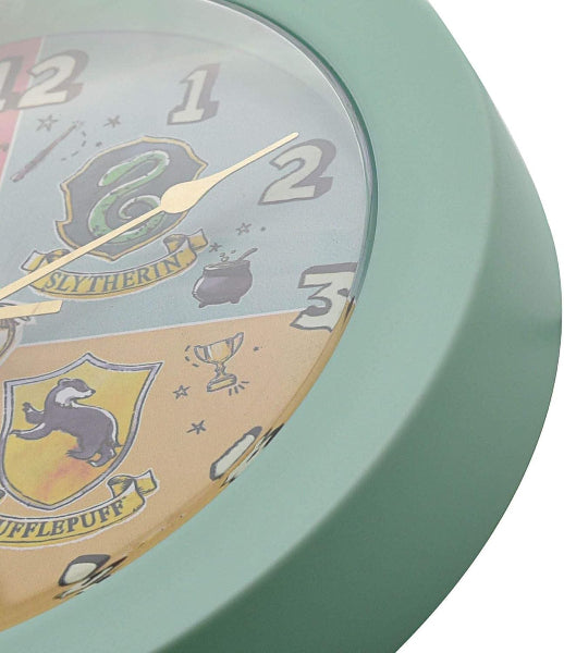 Round clock with Harry Potter-themed design on a light green background