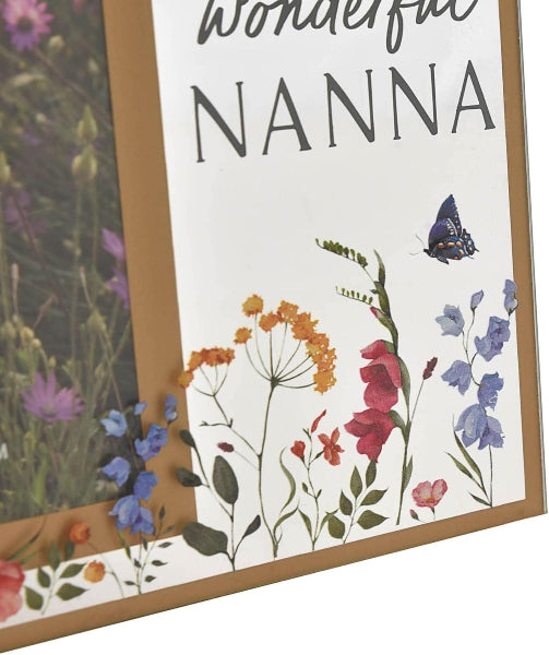 Decorative sign with flowers and a butterfly, featuring the text 'Wonderful NANNNA'.