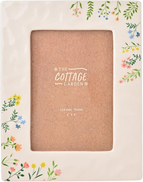 Ceramic frame with floral design on a white background