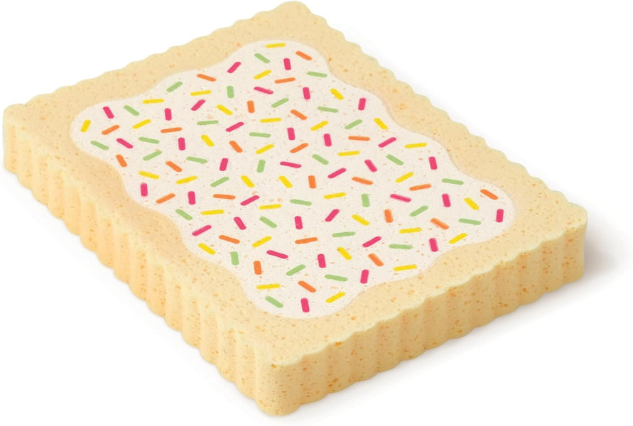 Square cookie with white icing and colorful sprinkles on a white background
